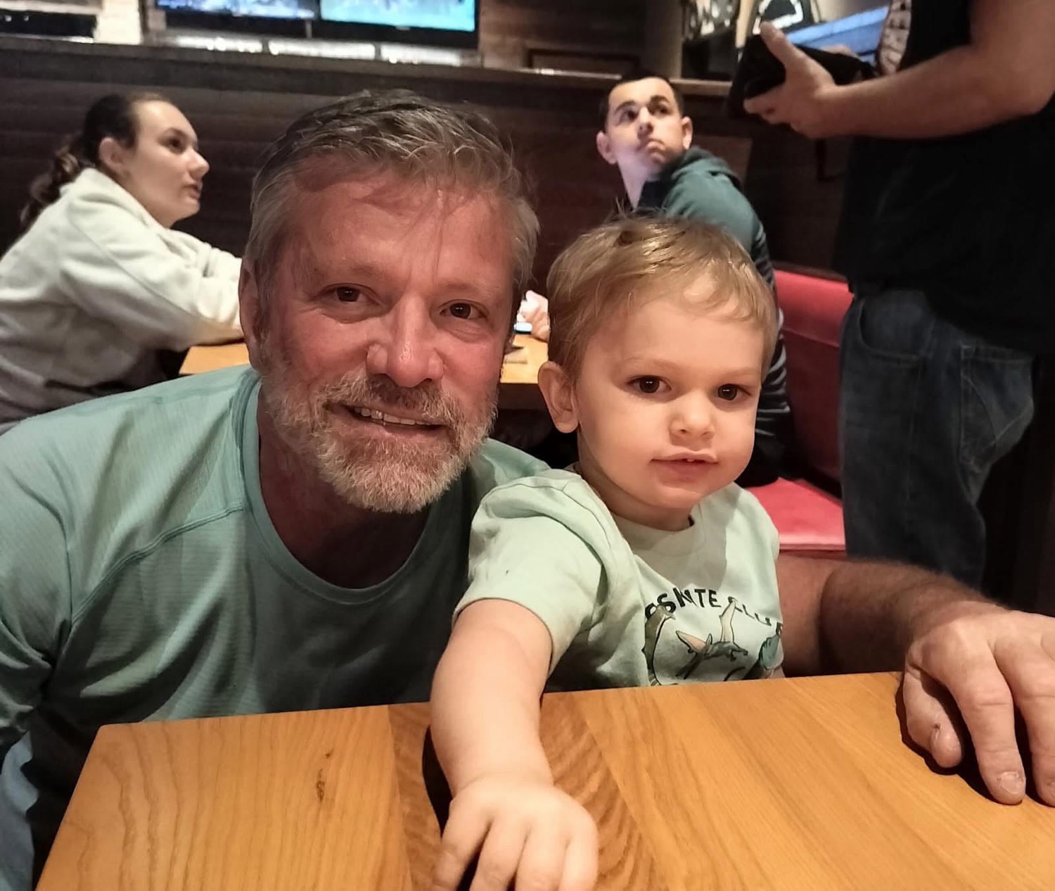 Neal Chambers with his grandchild