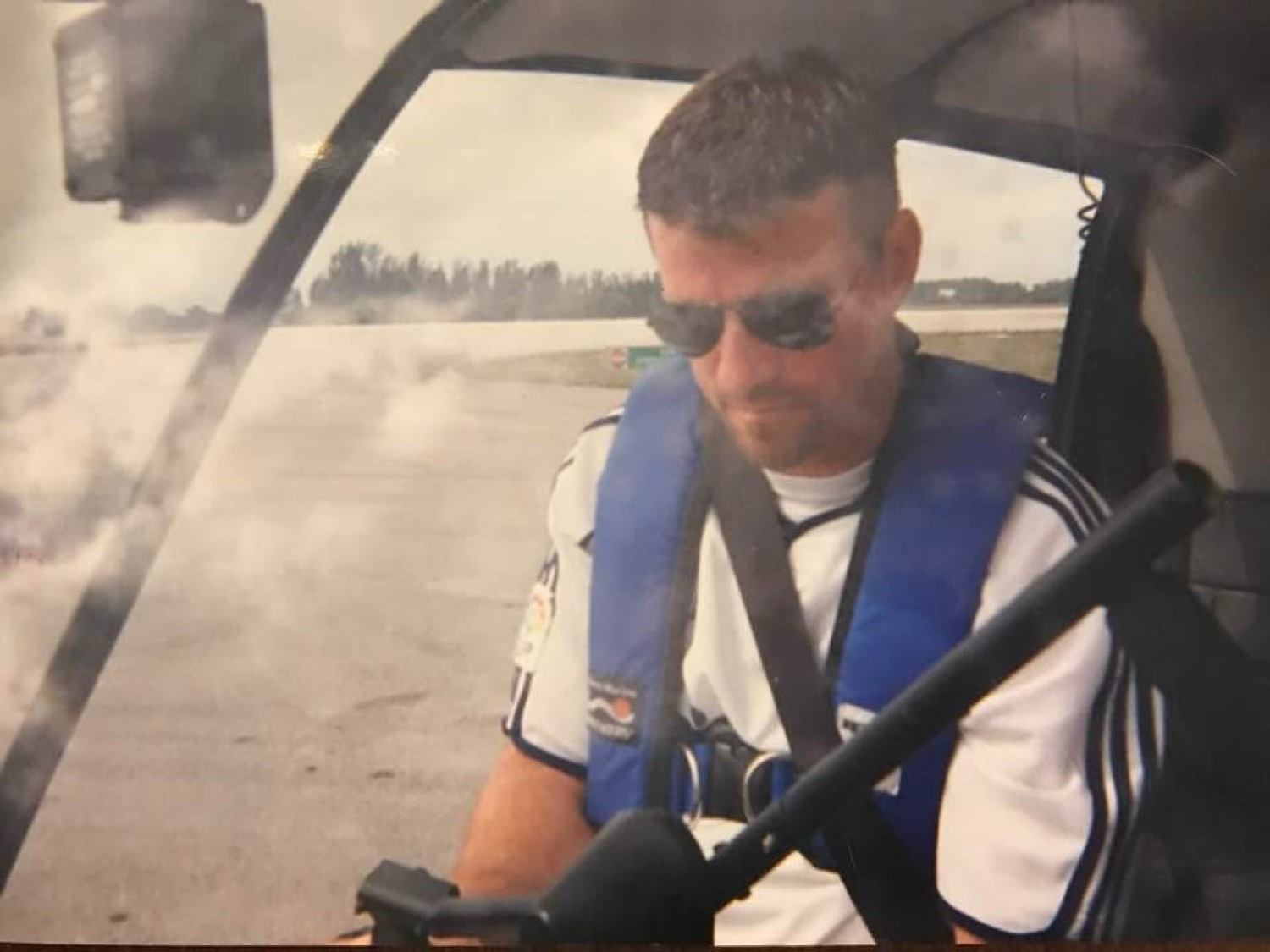 Neal in the helicopter cockpit
